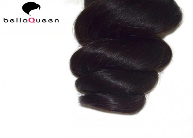 Cheveux lâches noirs naturels de vague de cheveux indiens de 6A Remy tissant sans produit chimique